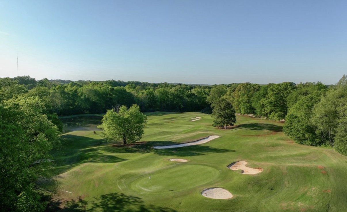 Chateau Elan golf course green with bunkers and pond