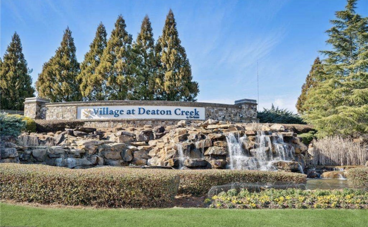 Village at Deaton Creek by Del Webb waterfall entrance sign