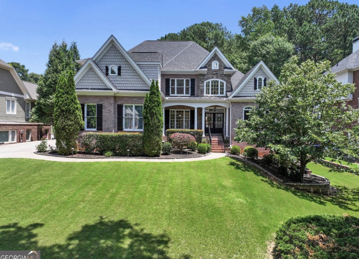 Brick and shake two-story home in Chateau Elan