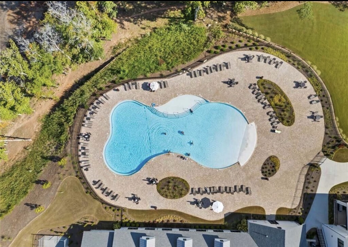 Aerial view of the outdoor resort-style pool at Cresswind at Twin Lakes