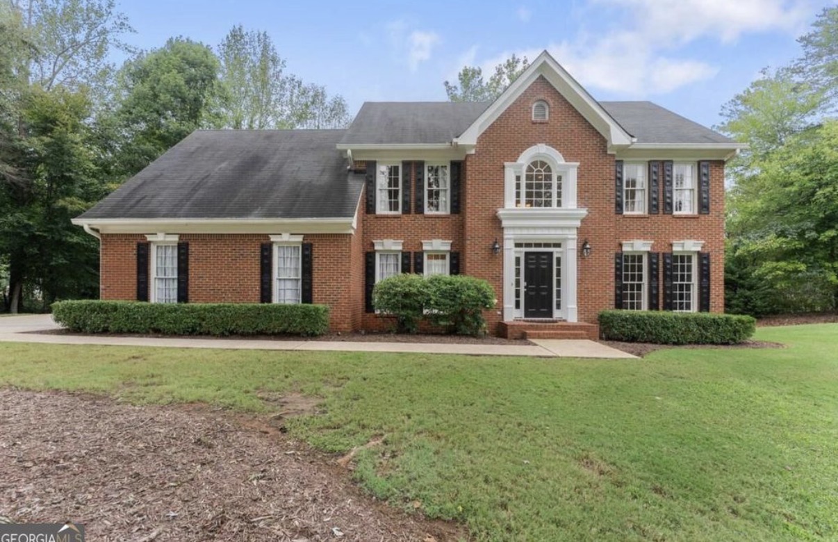 Traditional two-story brick home in Royal Lakes