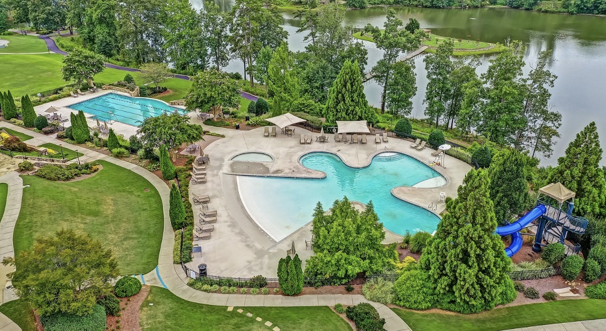 Sterling on the Lake pools with water slide beside the lake