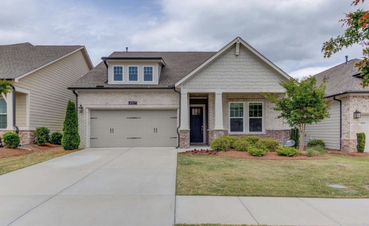 Brick ranch home in The Retreat at Sterling on the Lake