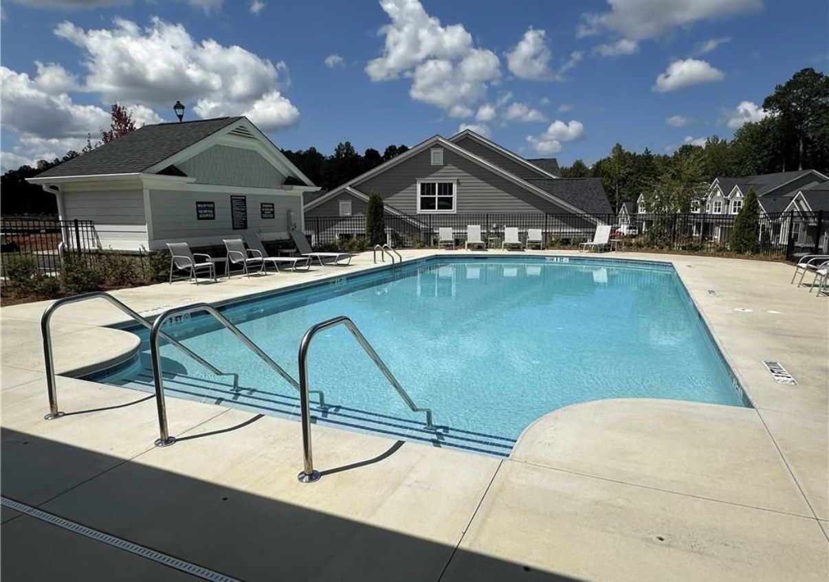 Orchards of South Forsyth outdoor swimming pool with lounge chairs