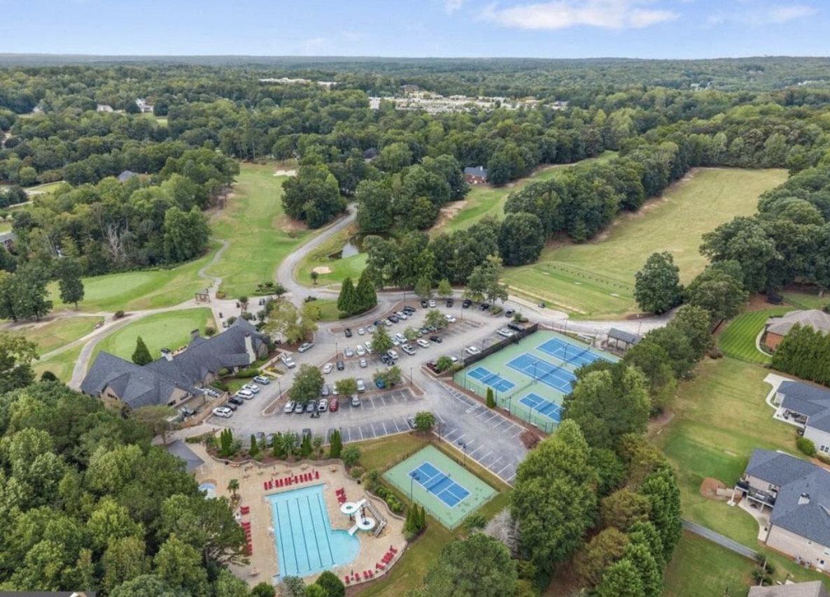 Royal Lakes clubhouse, pool and tennis courts seen from above